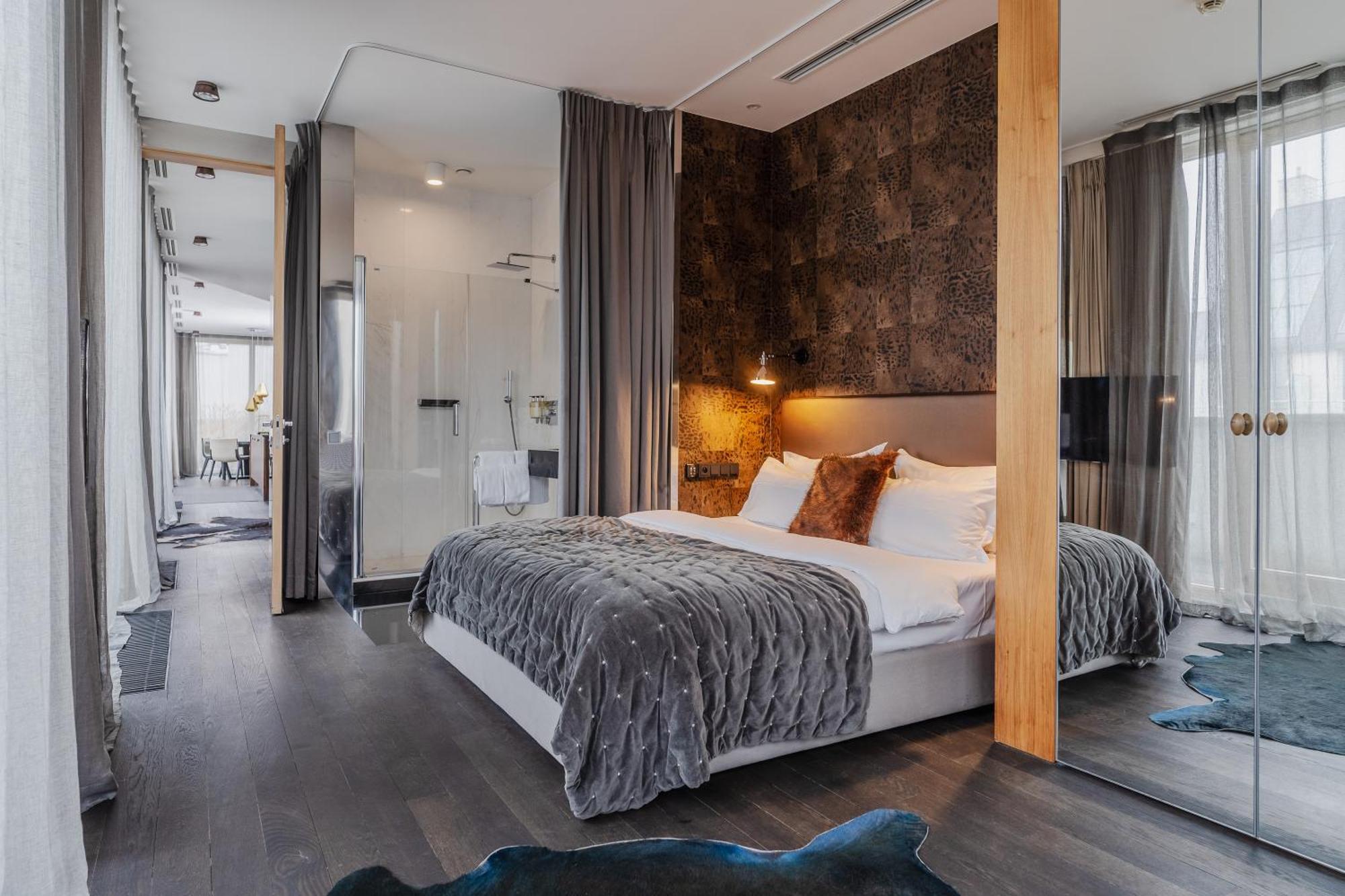 فندق إتش 15 البوتيكي وارسو المظهر الخارجي الصورة A bedroom at the hotel